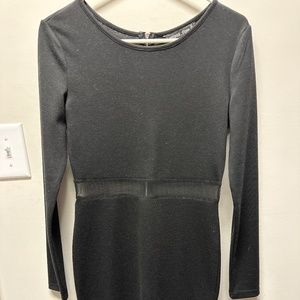 Black long sleeve dress with mesh detail at waist